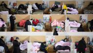 Patients with mild symptoms of the COVID-19 coronavirus resting at night in the temporary Fangcai Hospital set up in a sports stadium in Wuhan, in China's central Hubei province February 18, 2020.  AFP 
 