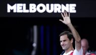 Switzerland’s Roger Federer waves as he leaves the court after winning his match against Tennys Sandgren of the U.S. REUTERS/Kim Hong-J