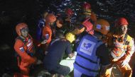 Rescue teams find a victim lost after the flash flood in the Sempor River in Sleman, Yogyakarta, Indonesia on 22 February, 2020. 