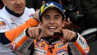 In this file photo taken on November 17, 2019 Repsol Honda Team's Spanish rider Marc Marquez celebrates after winning the MotoGP race of the MotoGP Valencia Grand Prix at the Ricardo Tormo racetrack in Cheste near Valencia, on November 17, 2019. / AFP /
