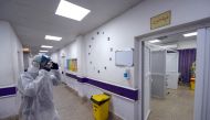A view outside the quarantine zone at the hospital in the central Iraqi holy shrine city of Najaf where the first case of coronavirus COVID-19 documented in Iraq is being treated.  AFP / Haidar HAMDANI