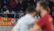  Soccer Football - Serie A - AS Roma v Lecce - Stadio Olimpico, Rome, Italy - February 23, 2020 General view of AS Roma fans wearing face masks during the match amid concern following a coronavirus outbreak in Italy REUTERS/Alberto Lingria 