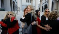 The Silence Breakers, a group of women who spoke out about Harvey Weinstein's sexual misconduct hug after a news conference outside Los Angeles City Hall a day after the Harvey Weinstein verdict in Los Angeles, US, February 25, 2020. Reuters/Mike Blake