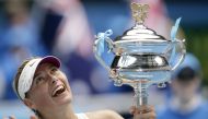 FILE PHOTO: Tennis - Australian Open - Melbourne Park - Australia - January 26, 2008 Russia's Maria Sharapova celebrates winning the Australian Open with trophy Action Images via Reuters/Brandon Malone