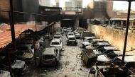 A car work shop in Shiv Vihar area of North East Delhi which was set on fire by rioters, February 26, 2020. (Imtiyaz Khan / Anadolu Agency)
 