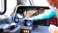 A cleaner sanitises the cockpit of a Trenitalia train at the Termini Station as part of measures to try and contain a coronavirus outbreak, in Rome, Italy, February 26, 2020. Trenitalia handout via Reuters 