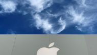  FILE PHOTO: The Apple logo is shown atop an apple store at a shopping mall in La Jolla, California, U.S., December 17, 2019, 2019. REUTERS/Mike Blake/File Photo 
