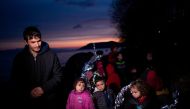 Migrants from Afghanistan are seen on a beach near the village of Skala Sikamias, after crossing part of the Aegean Sea from Turkey to the island of Lesbos, Greece, March 1, 2020. Reuters/Alkis Konstantinidis