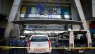 Policemen arrive outside Virra Mall where gunshots were fired in San Juan City, Metro Manila, Philippines, March 2, 2020. REUTERS/Eloisa Lopez