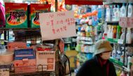 A sign announces that masks are sold out at a grocery store following the outbreak of a new coronavirus, in Hong Kong, China. Reuters / Tyrone Siu