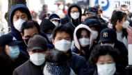 People stand in a long queue to buy face masks at a post office, after a shortage of masks amid the rise in confirmed cases of the novel coronavirus disease COVID-19, in Daegu, South Korea, March 4, 2020. REUTERS/Kim Kyung-Hoon