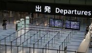 An empty departures gate is pictured at Haneda Airport in Tokyo, Japan, March 4, 2020. REUTERS/Stoyan Nenov