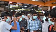 Young tourists wear facemasks as a preventive measure against the spread of the COVID-19 coronavirus outbreak at the Bangalore City Railway Station, on March 4, 2020. AFP / Manjunath Kiran