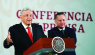Mexican President Andres Manuel Lopez Obrador (L) speaks next to the Head of Financial Intelligence Unit of the Secretariat of Finance and Public Credit (SHCP), Santiago Nieto, during a press conference at the National Palace in Mexico City on March 4, 20