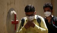  Men enter a hospital where a special ward has been set up for the coronavirus disease in Mumbai, India, March 5, 2020. REUTERS/Francis Mascarenhas 