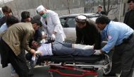 Hospital workers carry an injured person to an ambulance at a hospital after an attack in Kabul, Afghanistan March 6, 2020. Reuters/Omar Sobhani 