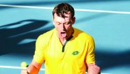 John Millman of Australia reacts after winning his Davis Cup qualifying tie tennis watch against Brazil in Adelaide on March 6, 2020. AFP / Brenton Edwards