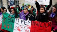 Mexican women protest against femicide in Mexico, during a protest demanding equality on International Women's Day in Paris, France, March 8, 2020. Reuters/Pascal Rossignol
 
