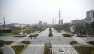A general view shows an empty street in Wuhan, China's central Hubei province on March 10, 2020. Chinese President Xi Jinping arrived in Wuhan on March 10 for his first visit to the epicentre of the coronavirus epidemic since the crisis erupted in January