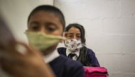 SOACHA, COLOMBIA - MARCH 11: Students are seen with their handmade face masks at the Julio Cesar Turbay school located at the urban area of ??the municipality of Soacha, a sector stigmatized by violence and lack of resources in Soacha, Colombia on March 1