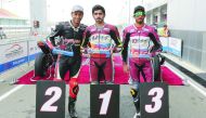 Abdulla Al Qubaisi (centre), Saeed Al Sulaiti (right) and Mashel Al Naimi pose with their trophies.