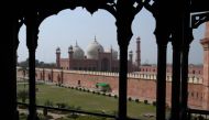 General view of the deserted Badshahi Mosque closed amid concerns over the spread of the COVID-19 novel coronavirus, in Lahore on March 16, 2020. / AFP / ARIF ALI