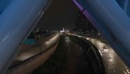 Motorists travel on the near-deserted Ampang-Kuala Lumpur Elevated Highway on the eve before Malaysia imposes a lockdown on travel amid fears over the spread of the COVID-19 coronavirus, in Kuala Lumpur on March 17, 2020. / AFP / Mohd RASFAN