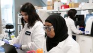Research assistant Huda Rabi and lab technician Hannah Huynh, of RNA medicines company Arcturus Therapeutics, conduct research on a vaccine for the novel coronavirus (COVID-19) at a laboratory in San Diego, California,  March 17, 2020. Reuters/Bing Guan
