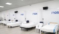 This handout image released by Barcelona City Hall on March 29, 2020 shows beds at the extension of the Vall d'Hebron Hospital in Barcelona, set-up for coronavirus patients. AFP