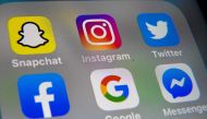 In this file photo taken on October 01, 2019 a picture taken in Lille shows the logo of mobile app Instagram, Snapchat, Twitter, Facebook, Google and Messenger displayed on a tablet. AFP / Denis Charlet