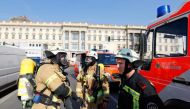 Firefighters arrive at the castle on the Spreeinsel after a fire broke out, in Berlin, on April 8, 2020.PHOTO: REUTERS