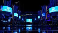 :LOS ANGELES, - APRIL 09: L.A. Live is illuminated in blue lights during the coronavirus pandemic on April 09, 2020 in Los Angeles, United States. Landmarks and buildings across the nation are displaying blue lights to show support for health care workers