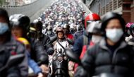 Commuters wear face masks to protect themselves from the coronavirus disease (COVID-19) spread during morning rush hour traffic in TAIPEI, Taiwan April 8, 2020. REUTERS/Ann Wang 