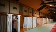 Katsuya Asao, 54, prepares to rest at a shelter provided by Kanagawa prefecture for the people who can’t afford to rent an apartment and used to stay at designated internet cafes, which are closed due to the COVID-19 coronavirus outbreak state of emergenc