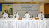 Barwa Real Estate Group Chairman H E Salah bin Ghanem Al Ali and other Board Members during the Ordinary General Assembly Meeting, yesterday.