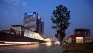 FILE PHOTO: Vehicles run past the Centaurus mall in Islamabad, Pakistan November 23, 2017. REUTERS/Faisal Mahmood