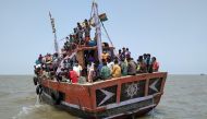 Indian fishermen, who said they were refused entry at two ports after a nationwide lockdown was imposed to fight the coronavirus disease (COVID-19), travel in the Arabian Sea attempting to reach to their home state Maharashtra from the western state of Gu