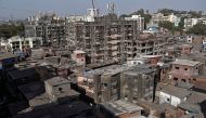 Buildings stand in Dharavi, one of Asia's largest slums, during a nationwide lockdown in India to slow the spread of COVID-19, during the coronavirus disease outbreak, in Mumbai, India, April 7, 2020. REUTERS/Francis Mascarenhas 