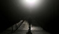 A man walks down an empty street, amid the coronavirus disease (COVID-19) outbreak in Madrid, Spain, April 24, 2020. REUTERS/Susana Vera TPX IMAGES OF THE DAY
 