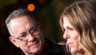 (FILES) In this file photo taken on November 07, 2018 Actors Tom Hanks (L) and his wife actress/singer Rita Wilson attend 