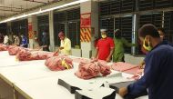 Labourers work in a garment factory during a nationwide coronavirus lockdown as a preventive measure against the COVID-19 coronavirus, in Asulia on April 26, 2020. AFP / STR