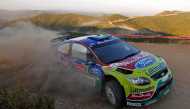FILE PHOTO: Mikko Hirvonen of Finland competes in a Ford Focus RS during the third stage of the Portugal Rally WRC in Algarve May 30, 2010. REUTERS/Jose Manuel Rbeiro