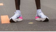 This file photograph taken on October 12, 2019, shows the controversial Nike AlphaFly prototype shoes worn by Kenya's Eliud Kipchoge as he stands after his attempt to bust the mythical two-hour barrier for the marathon in Prater Park, Vienna, with an unof