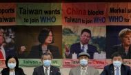 Taiwan Health Minister Chen Shih-chung, parliament members and activists hold a news conference about Taiwan's efforts to get into the World Health Organization in Taipei, Taiwan, May 15, 2020. REUTERS/Ann Wang 