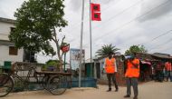 :A Cyclone Preparedness Programme (CPP) volunteer uses a megaphone to urge residents to evacuate to shelters ahead of the expected landfall of cyclone Amphan in Khulna on May 19, 2020. India and Bangladesh began evacuating more than two million people May