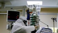 MOSCOW, RUSSIA - MAY 22: Healthcare workers wearing protective suit are seen on their duty in the intensive unit at a state hospital in Moscow, Russia on May 22, 2020. Russia remains second-worst-hit country globally, with 326,448 coronavirus cases. ( Sef