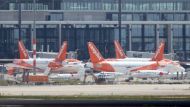 EasyJet planes are parked at the Berlin Schoenefeld airport, amid the spread of the coronavirus disease (COVID-19) in Schoenefeld, Germany, May 26, 2020. REUTERS/Fabrizio Bensch