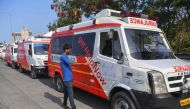 In this photograph taken on May 24, 2020, ambulance driver Alam Shaikh from HelpNow gets into his vehicle at a parking station, after the government eased a nationwide lockdown imposed as a preventive measure against the COVID-19 coronavirus, in Mumbai. A