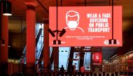 Public health messages are seen during morning rush hour at Canary Wharf underground station, following the outbreak of the coronavirus disease (COVID-19), London, Britain, June 1, 2020. REUTERS/Toby Melville
