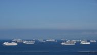 A general view shows cruise ships anchored at Manila Bay on May 31, 2020. More than 20 cruise ships are anchored at Manila Bay waiting for disembarkation clearance from authorities for their Filipino crews who have undergone swab tests for the COVID-19 co